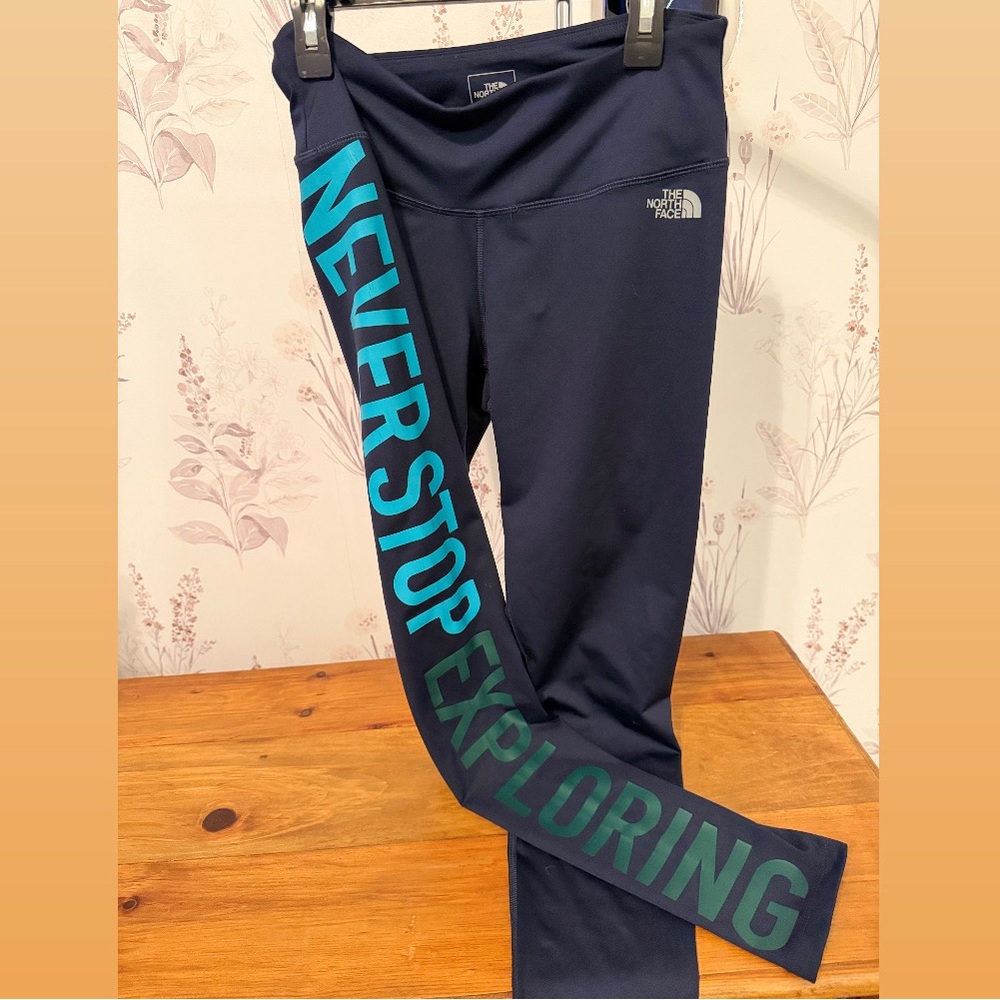 The North Face Flashdry Leggings size M with “Never Stop Exploring” Graphic